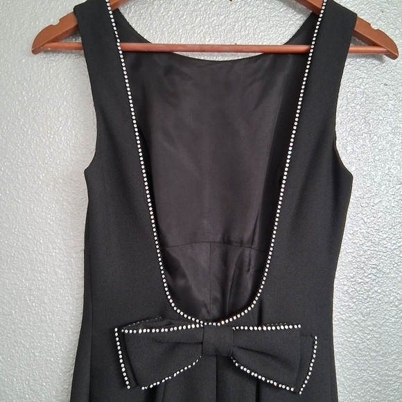 Cach`e Black Jumpsuit With A Scoop Back Outlined With Rhinestones   Size 6 - Picture 10 of 16